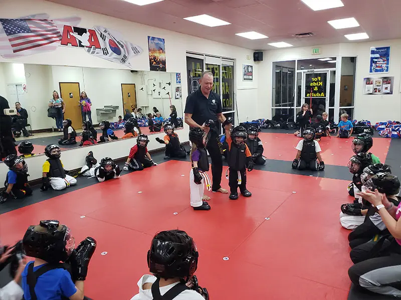 kids in Windermere martial arts class improving focus, discipline, and listening skills through martial arts training