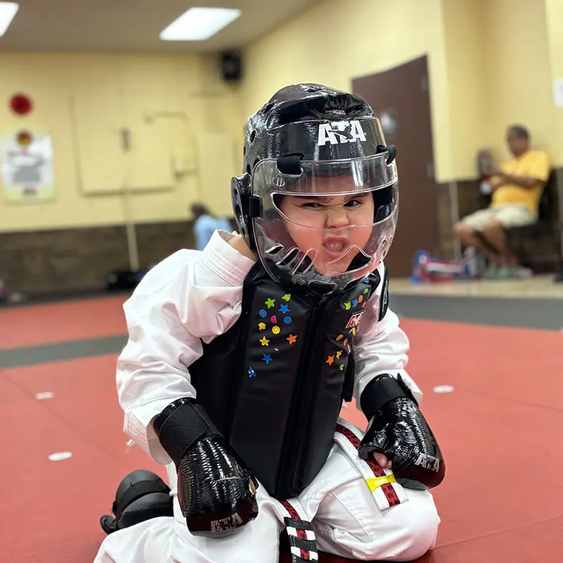 Children practicing martial arts in Windermere, developing lifelong discipline, focus, and self-respect.