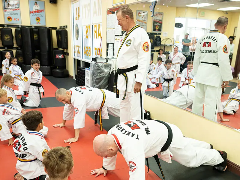 families practicing martial arts in Windermere, building confidence, focus, and discipline through martial arts training.
